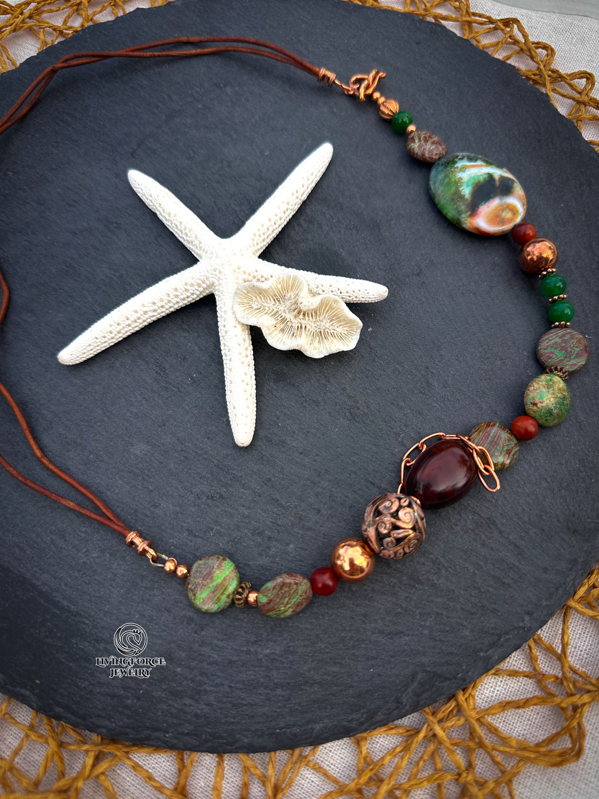 Forest Path Necklace

Jade, jasper, agate, wood, copper, and leather