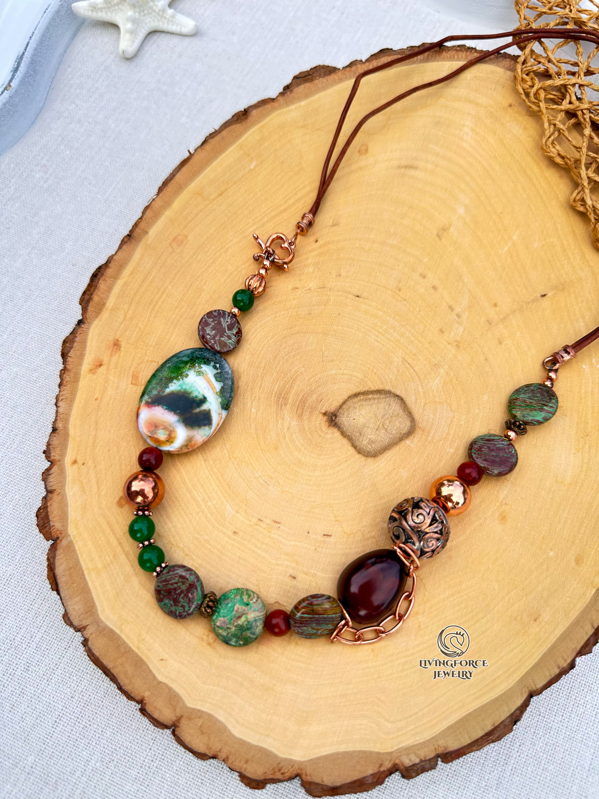 Forest Path Necklace

Jade, jasper, agate, wood, copper, and leather