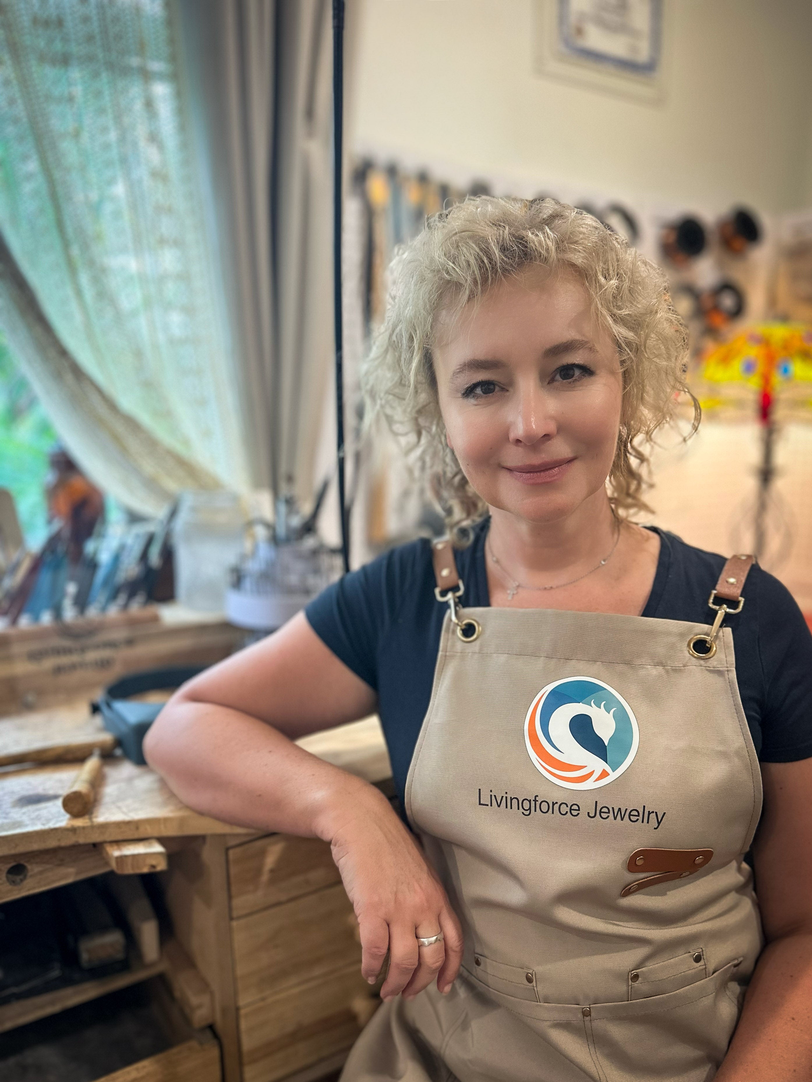 Livingforce founder at her jewelry bench